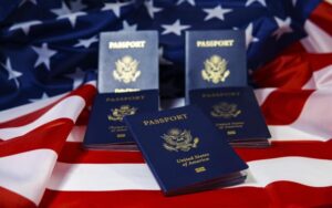 Decorative picture of passports and an American flag.